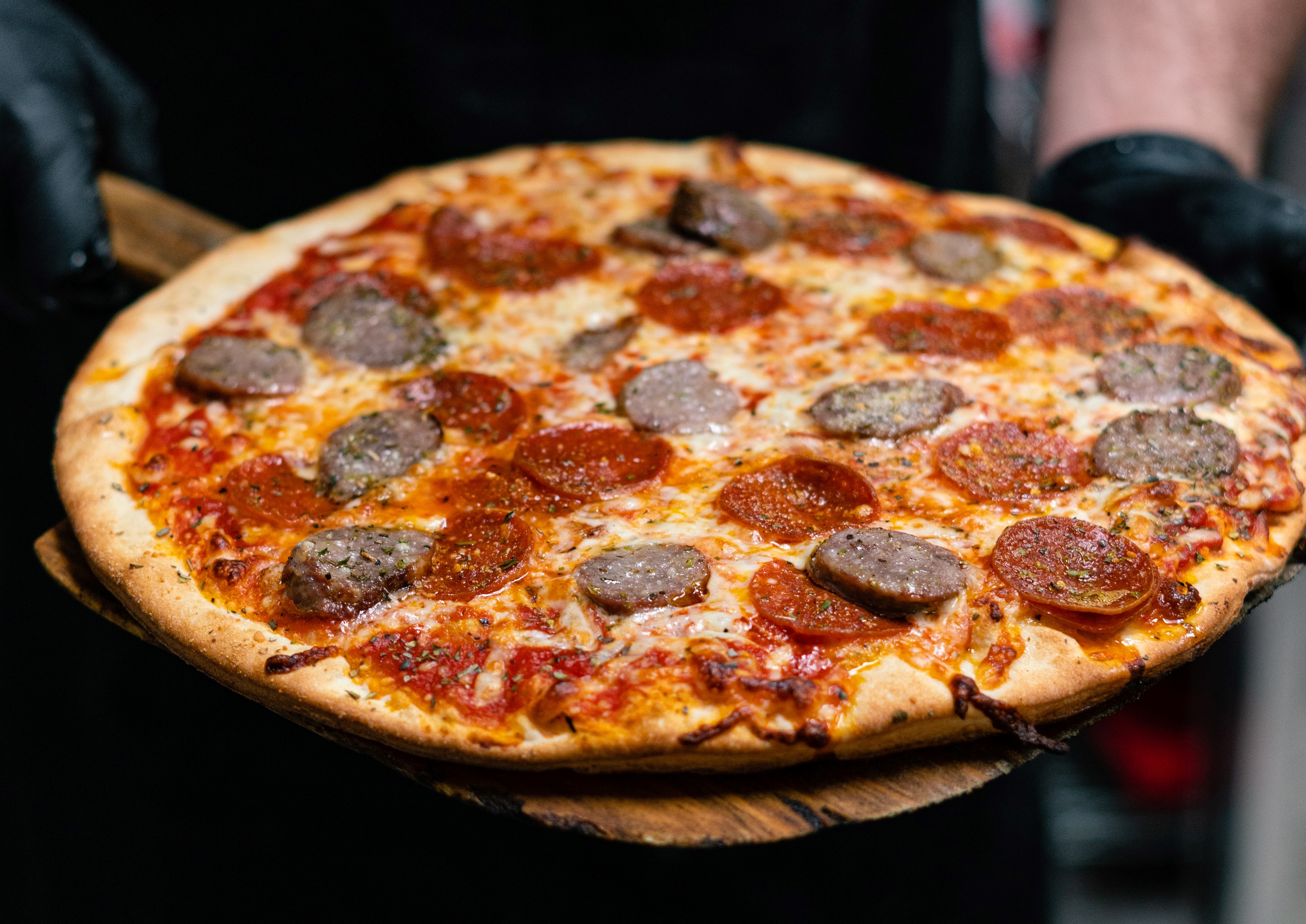 Five Places to Celebrate National Sausage Pizza Day on October 11